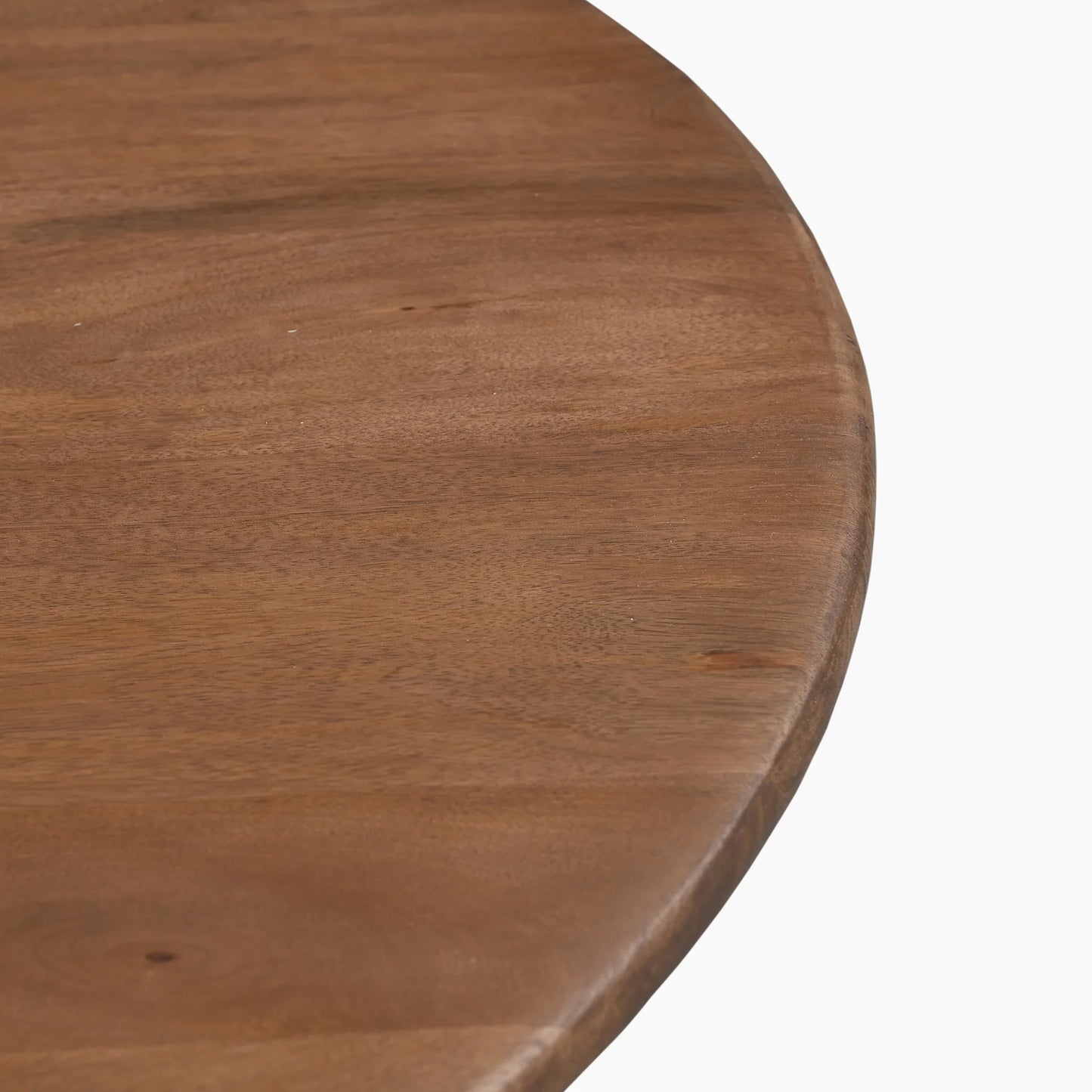 Close-up of a wooden table surface with a white background