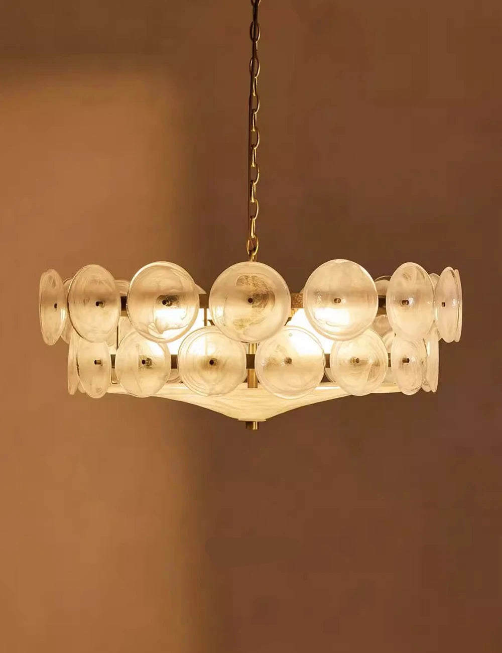 Chandelier with glass shades on a brown background