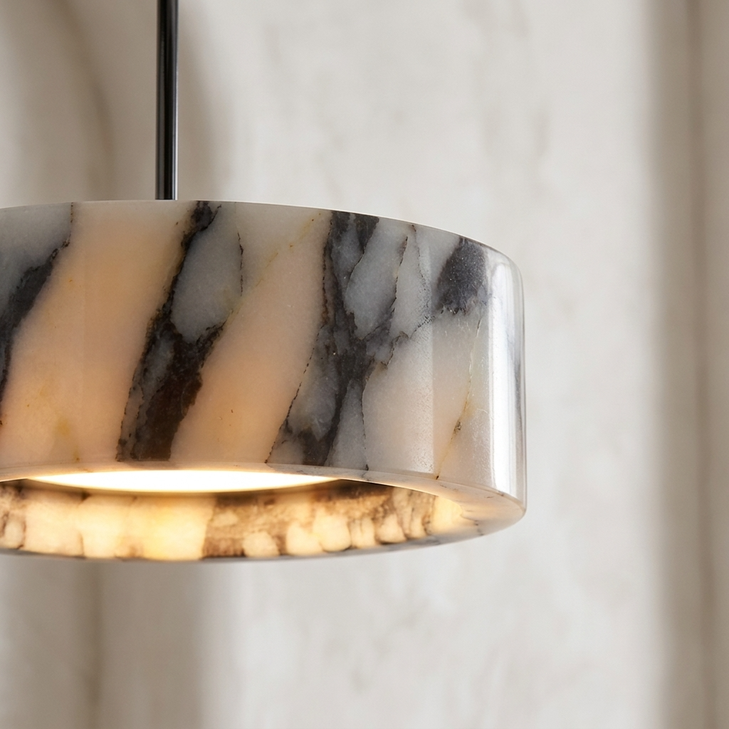 Marble-patterned pendant light against a neutral background