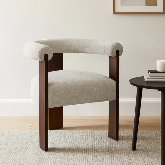 Chair with wooden frame and beige cushion in a room setting