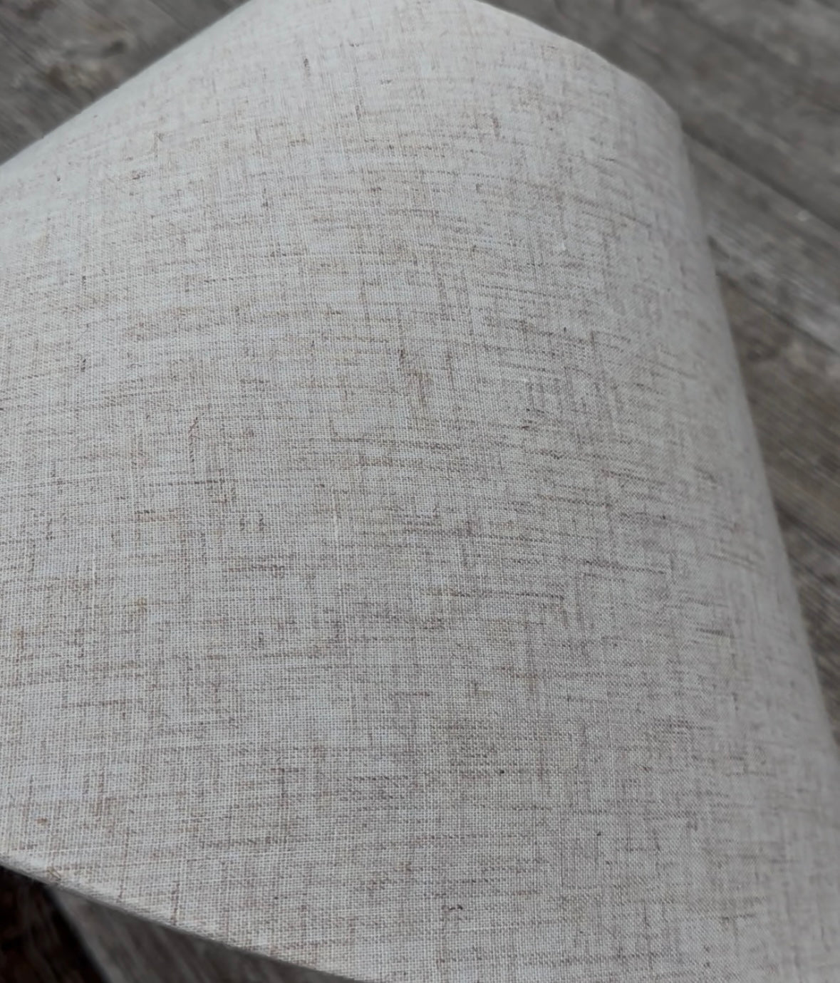 Close-up of a textured linen style lamp shade 