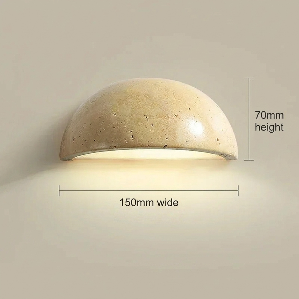 Beige travertine wall-mounted light fixture with dimensions on a plain background