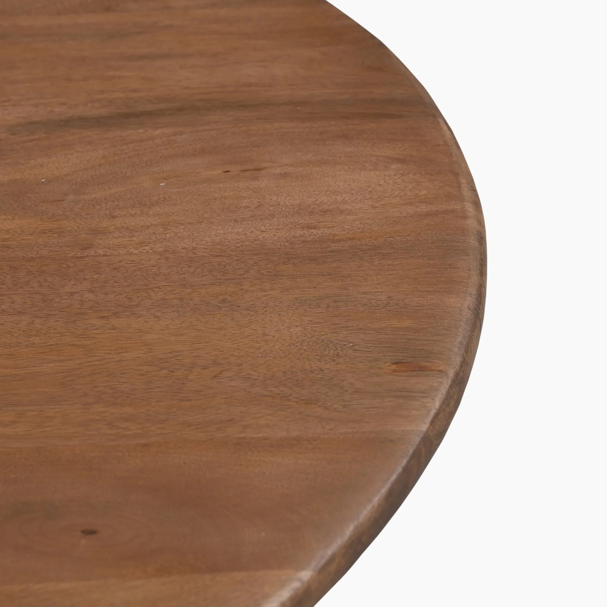 Close-up of a wooden table surface with a white background