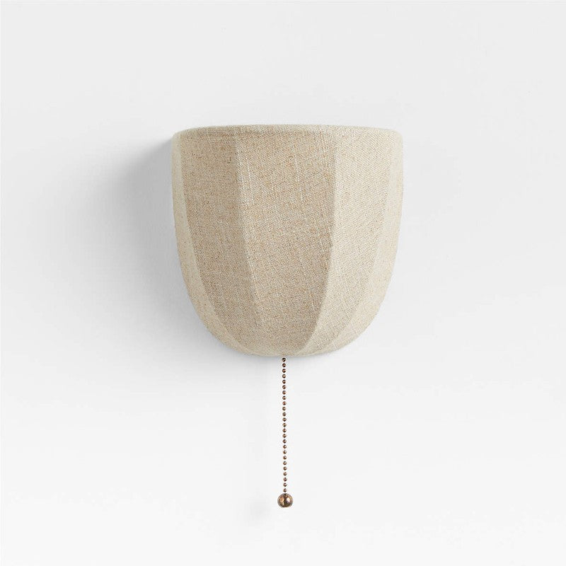 Beige wall-mounted light fixture with a pull chain on a white background