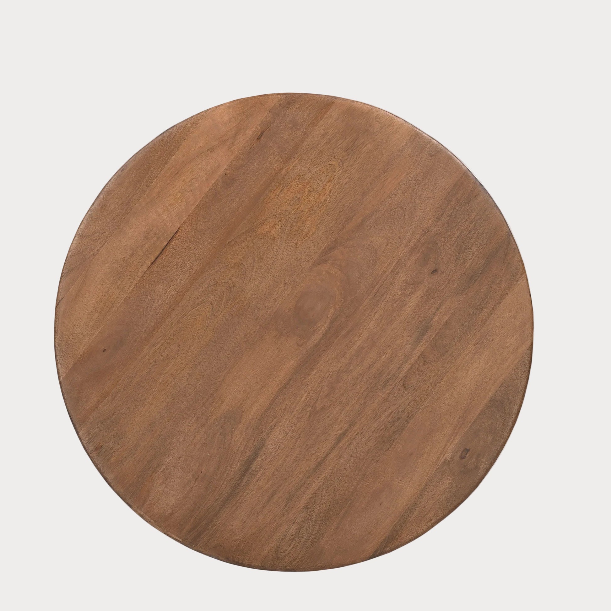 Round wooden table top on a white background