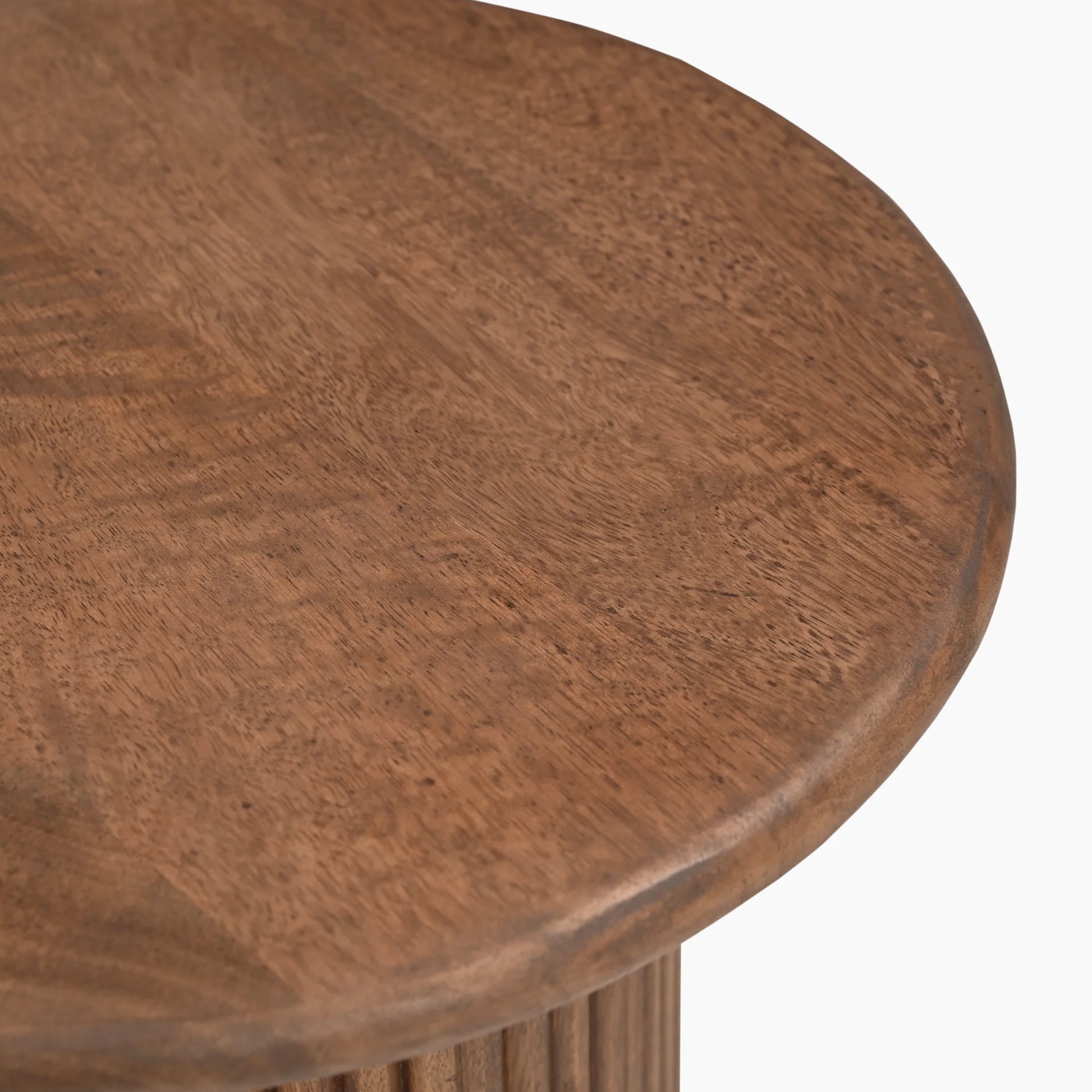 Close-up of a wooden round table with a white background