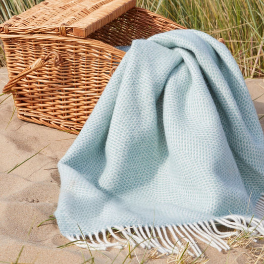 aberaeron beehive blanket in ocean on the beach for a seaside picnic