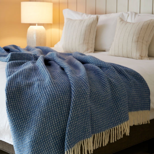 Waffle throw in bluebell with ivory fringe bedding